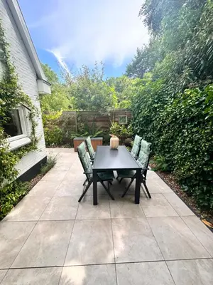 a table and chairs sitting on a patio at The Forester Schoorl in Schoorl