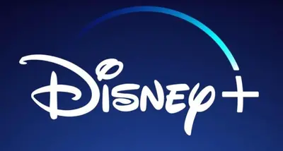 a sign for a disney logo on a blue background at The Forester Schoorl in Schoorl