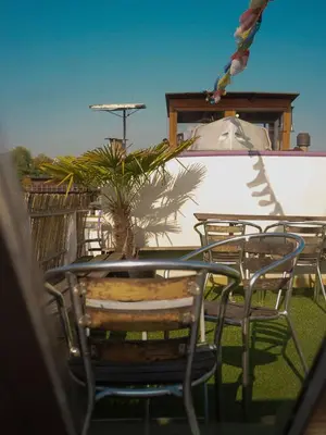 a table and chairs sitting on a patio at FLOW in Amsterdam