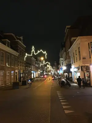 a city street at night with christmas lights at De Haarlemse Logeerkamer in Haarlem