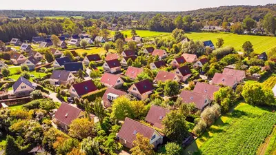 an aerial view of a village with houses at Huisje Avondrood in Schoorl