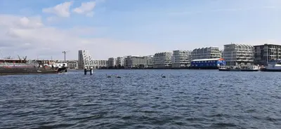 a large body of water with buildings in the background at Waterfront Studio in Amsterdam