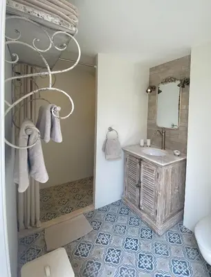 a bathroom with a sink and a mirror at Bed and Breakfast Amsterdam in Amsterdam