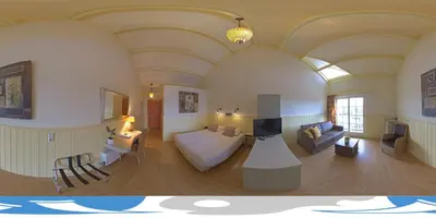 a large living room with a couch and a table at Jachthaven Hotel Borger in Vinkeveen