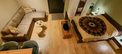 an overhead view of a living room with a couch at Inntermezzo in Almere