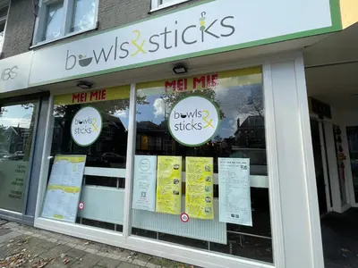 a store with signs in the windows of a store at City room in Alkmaar