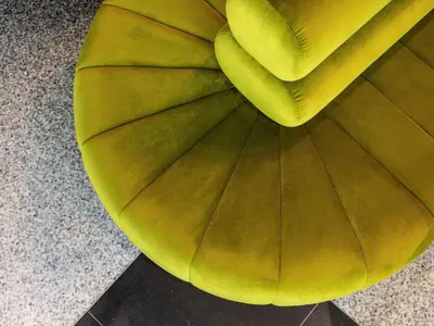 a yellow bean bag chair sitting on the floor at Tribe Amsterdam City in Amsterdam