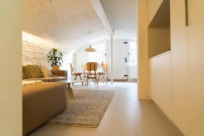 a living room with a couch and a table at Vlinder's in Utrecht