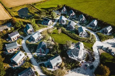 an aerial view of a group of houses at De Molen van Egmond by Droomvilla in Egmond aan den Hoef