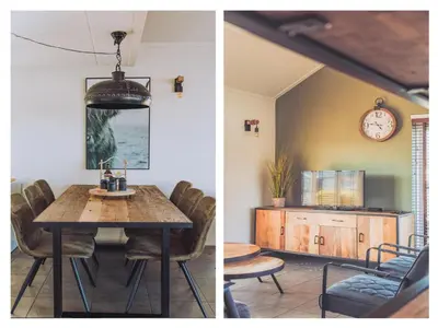 a dining room with a table and a clock on the wall at Het Kraaijennest Miva in Uitgeest