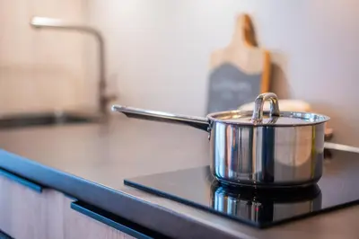 a pot sitting on top of a kitchen counter at Huis 8 Studio's in Katwijk aan Zee