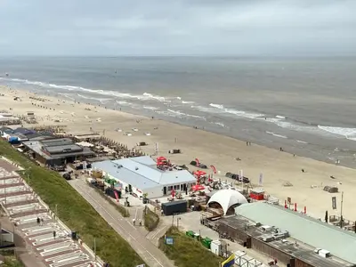 an aerial view of a beach with a building at Apartment Malisa in Zandvoort