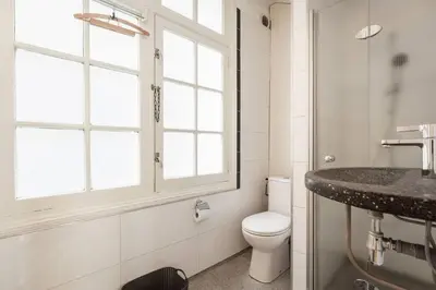a bathroom with a toilet and a sink at New! Private Authentic Apartment In City Centre! in Amsterdam