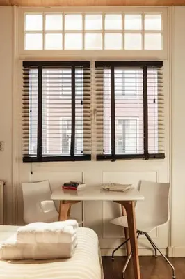 a room with a table and chairs and a window at New! Private Authentic Apartment In City Centre! in Amsterdam