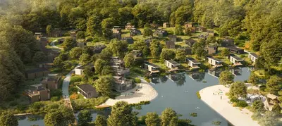 an aerial view of a village on a river at De Parel - Mystical spaces to discover! in Zeewolde