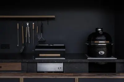 a kitchen with a counter with a stove and utensils at De Parel - Mystical spaces to discover! in Zeewolde