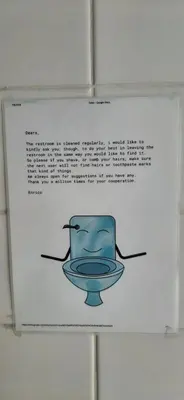 a picture of a blue toilet on a sign at NICOLE, not for parties, not a hotel, room with shared bathroom, no kitchen in Amsterdam