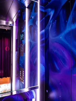 a room with a wall with a blue and purple at Hotel VIC in Leiden