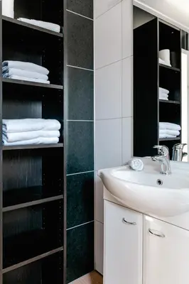 a bathroom with a sink and a mirror at Rijk aan Zee Ecolodges in Wijk aan Zee