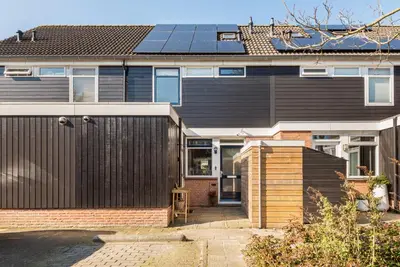 a house with solar panels on top of it at De Zonnestraal in Bergen