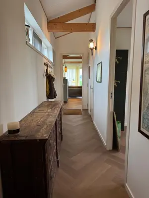 a hallway with a wooden counter in a room at Beautiful Countryside house, close to Amsterdam in Broek in Waterland