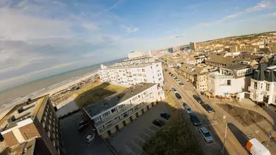 an aerial view of a city and the ocean at Studio Tara at the Beach with Private Parking in Zandvoort