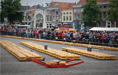 a crowd of people watching a parade with inflatable dogs at Lovely Home In Egmond Aan Zee With Wifi in Egmond aan Zee