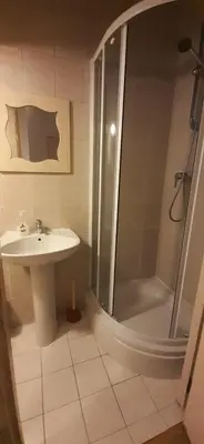 a bathroom with a shower and a sink at IRU, not for parties, not a hotel, room with no kitchen in Amsterdam
