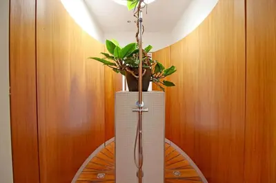 a vase with a plant on top of a table at Elegant penthouse LOFT of 250 m2 in city centre with huge roofgarden 80 m2 in Amsterdam
