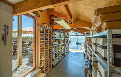 a library with a lot of books on shelves at Nice Home In Breukeleveen With Wifi in Breukeleveen