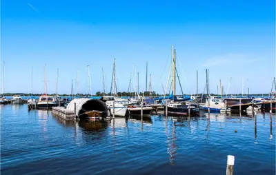 a bunch of boats docked in the water at Nice Home In Breukeleveen With Wifi in Breukeleveen