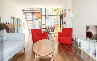 a living room with a couch and two chairs and a table at Nice Home In Breukeleveen With Wifi in Breukeleveen
