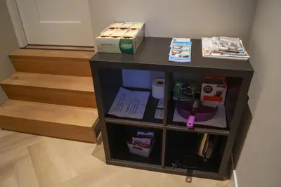 a small table with a box on top of it at Super de luxe privékamer op een toplocatie - Room 1 in Egmond aan Zee