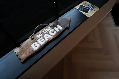 a sign hanging on a counter in a room at Super de luxe privékamer op een toplocatie - Room 1 in Egmond aan Zee