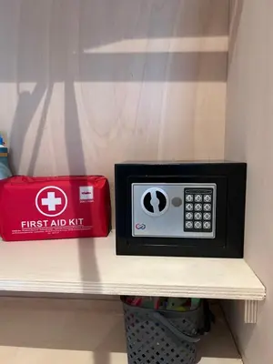 a first aid kit sitting on a shelf at Blossombed in Voorhout
