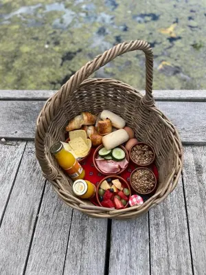 a basket filled with different types of food on a table at GreenFloat Boskoop - #1 in Boskoop