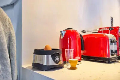 a counter with a toaster and a toaster and a toaster at Studio next to Skinny Bridge near Rembrandtsquare in Amsterdam