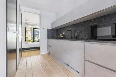 a kitchen with a sink and a counter top at Resident Moose in Amsterdam