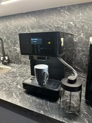 a coffee maker on a counter with a cup at Resident Moose in Amsterdam
