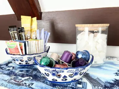 two blue and white bowls sitting on a table at Flinder Amsterdam in Amsterdam