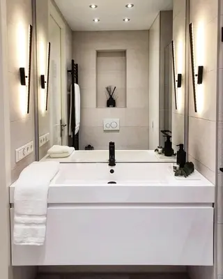 a white bathroom with a large white sink at New stylish 1 bedroom apt w/ 2 balconies in Centrum in Amsterdam