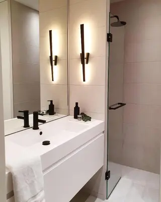 a bathroom with a white sink and a shower at New stylish 1 bedroom apt w/ 2 balconies in Centrum in Amsterdam