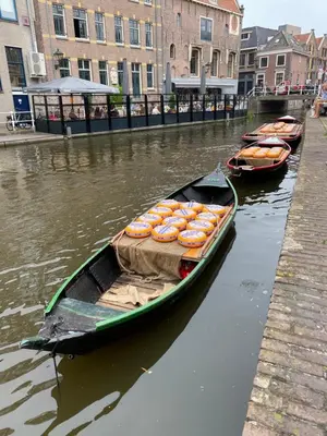 a group of boats in the water next to aarf at King Suite Centre Alkmaar in Alkmaar