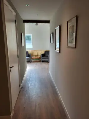 an empty hallway with a room with a hallway at B & B De Tocht in Berkhout