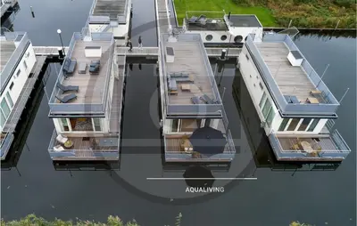 an overhead view of a house on the water at Amazing Ship In Aalsmeer in Aalsmeer