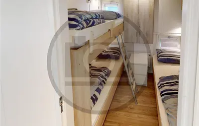 a room with two bunk beds in a room at Amazing Ship In Aalsmeer in Aalsmeer