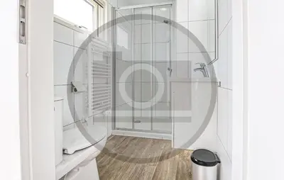 a bathroom with a shower and a toilet at Awesome Ship In Aalsmeer With Lake View in Aalsmeer