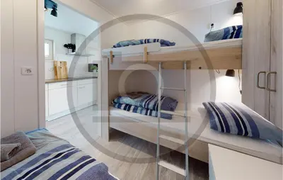 a room with two bunk beds in a room at Stunning Ship In Aalsmeer With Kitchen in Aalsmeer