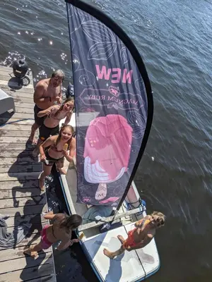 a group of people on a sail boat on the water at 6 personen luxe houseboat Splendid Monnickendam nabij Amsterdam in Monnickendam