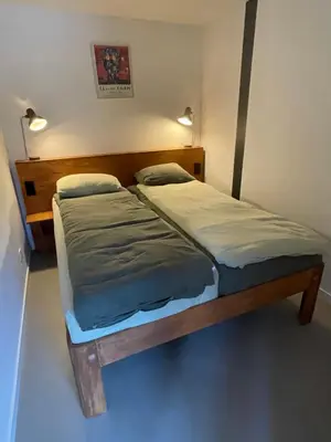 a bedroom with two twin beds in it at Studio 28A5 with free parking place in Amsterdam